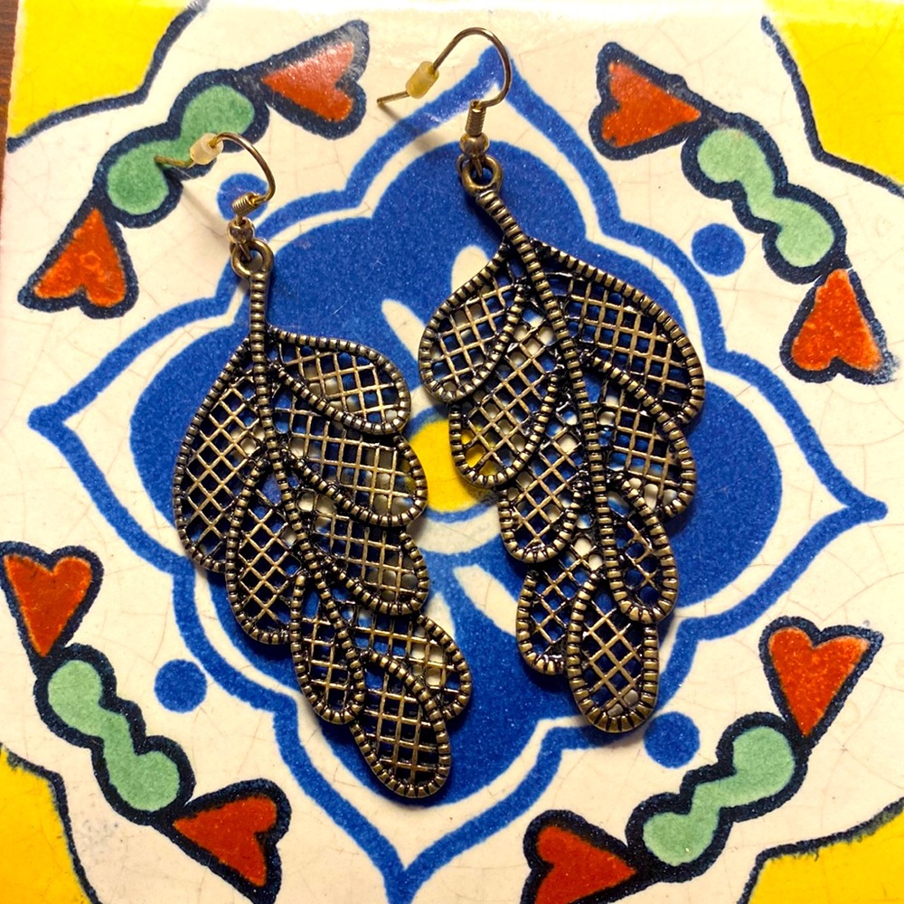 Earrings by Versona.